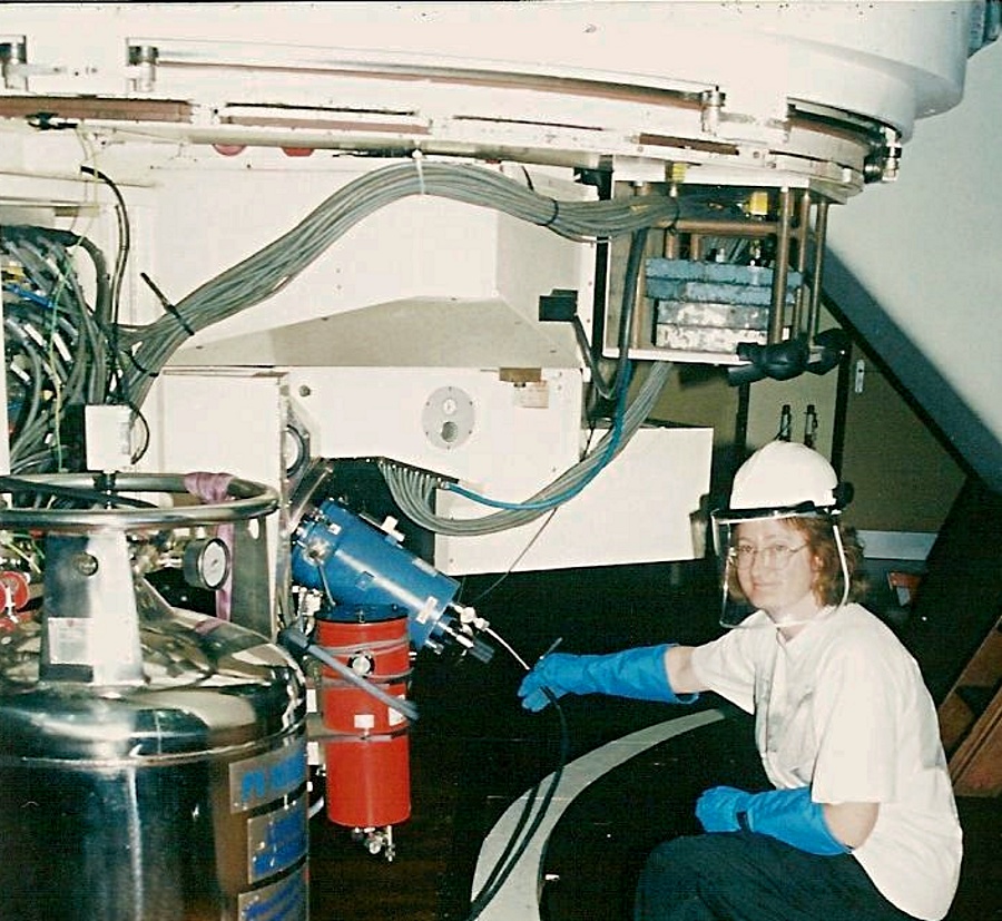 Sheila Crosby filling an instrument with liquid nitrogen in the Isaac Newton Telescope.